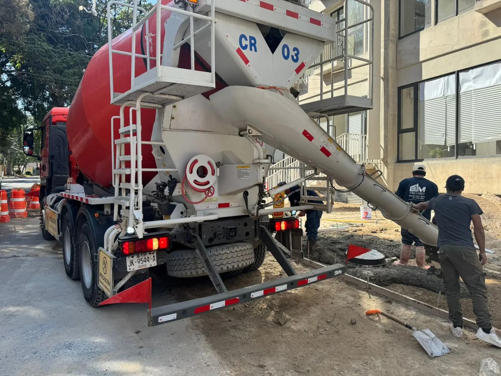 Mixer truck pouring pavement replacement