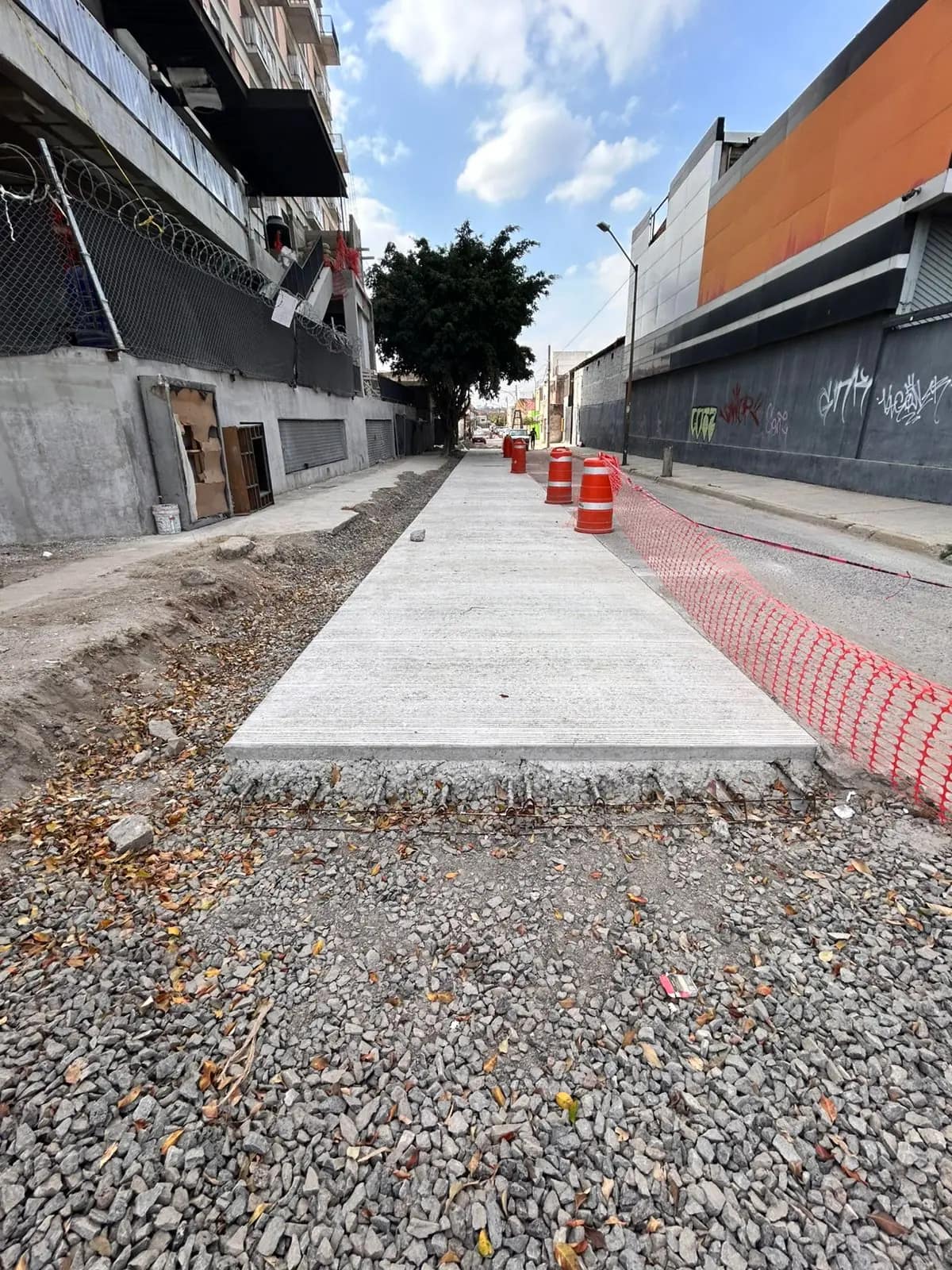 New concrete strip over the sewer line