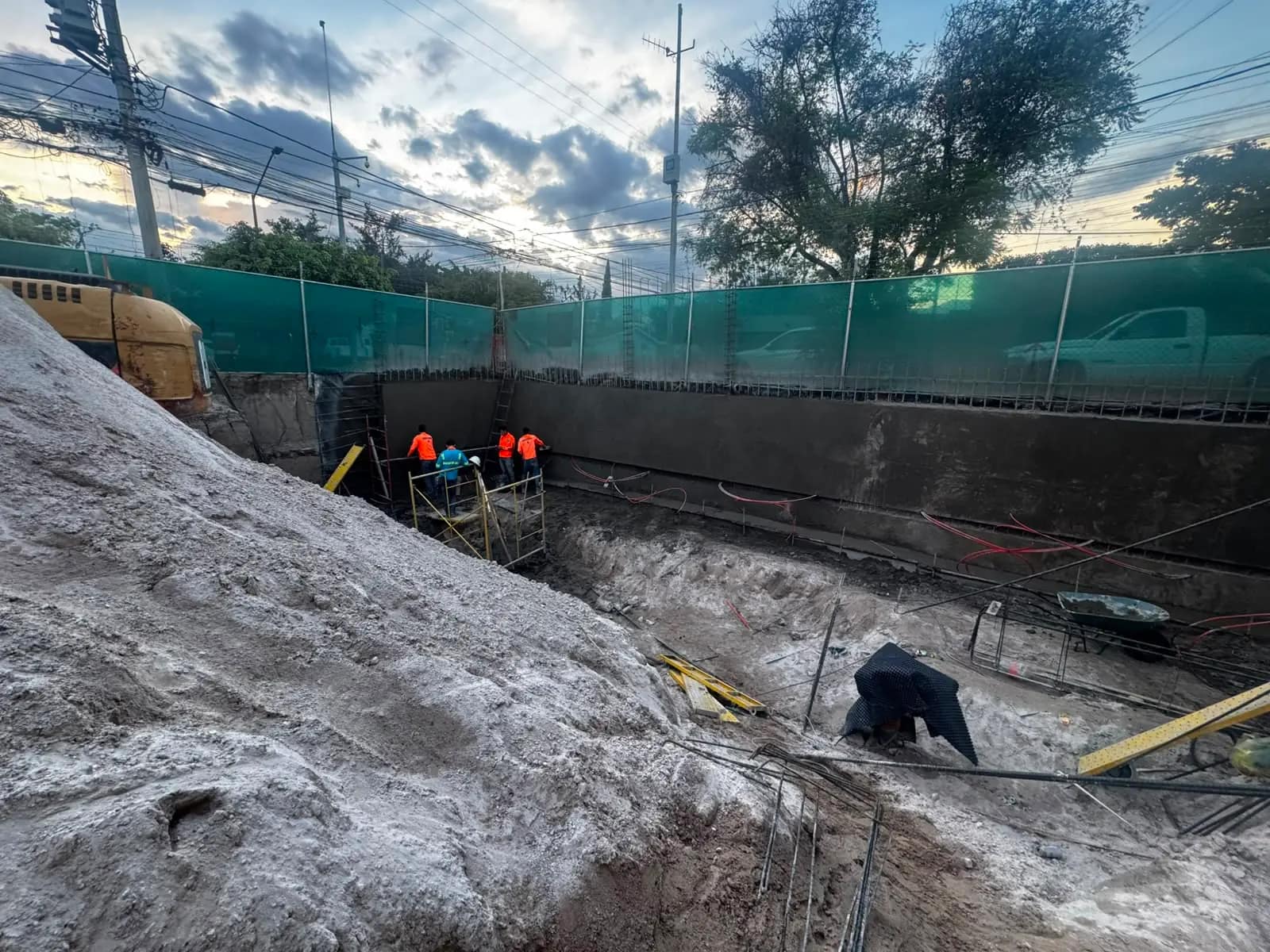 Crew at the bottom of the excavation