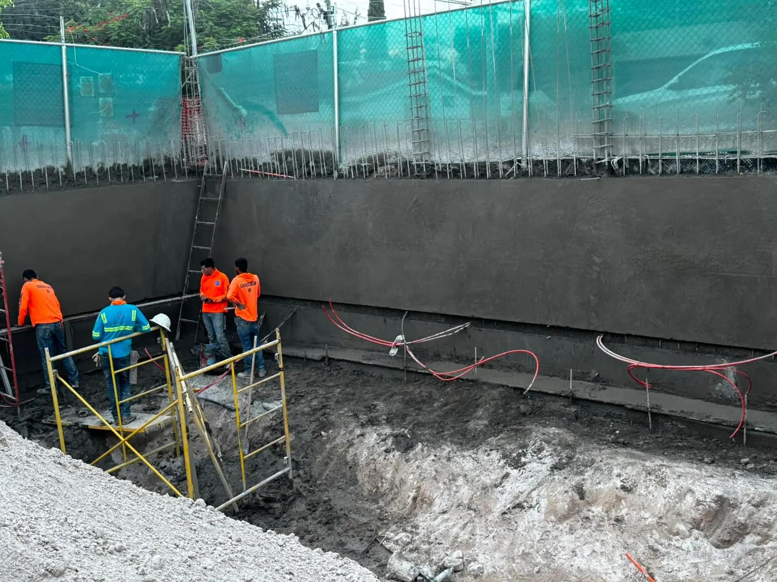 Finished retaining wall and scaffolding
